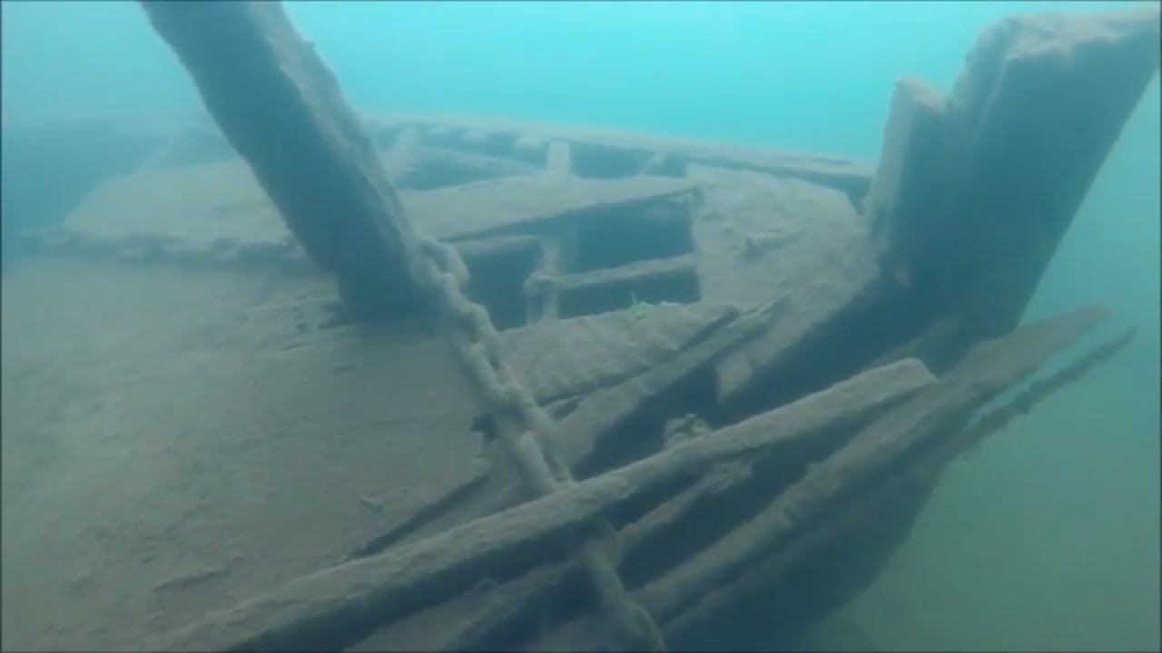 Treasure dive found rare old bottle flag and shipwrecks