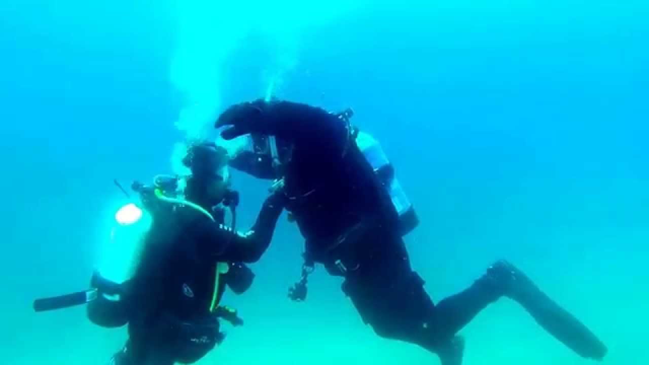 Learning to use a dry suit on SCUBA